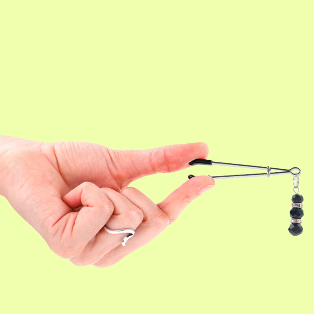 PINZAS PARA PEZONES PLATEADA FINA CON TRIPLE BOLA DE VIDRIO NEGRO 7 CM - KINK